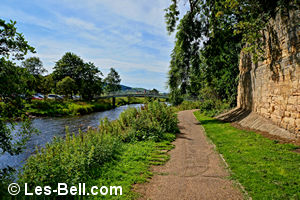 Walking beside the River Coquet to the footbridge